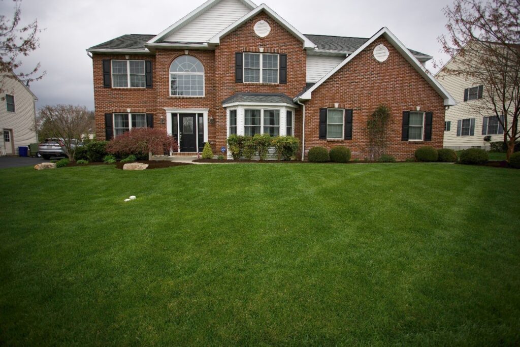 A large, beautifully maintained lawn.